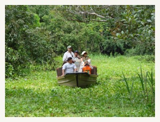 SKIFF-ON-FLOODED-FOREST amazon cruise